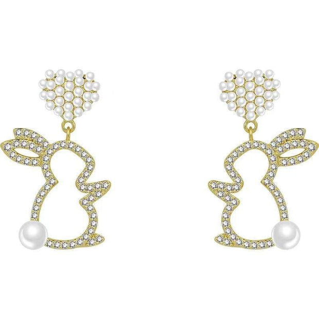 Pearl Bunny Earrings For Women Silver Pin Earrings
 Product information:
 
 Color: White
 
 Applicable population: Female
 
 Material: Alloy
 
 Modeling: Rabbit
 
 Popular elements: Rabbit
 
 Style: Cute


Packing lESAAS Merch DesignDesigns by SAASWomen Silver Pin Earrings
