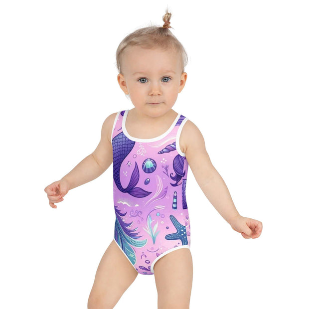 Girls' Magical Mermaid One-Piece Swimsuit - Purple Fantasy Swimwear wiDive into a sea of enchantment with our Girls' Magical Mermaid One-Piece Swimsuit! This delightful swimwear, perfect for young ocean lovers, features a whimsical merDesigns by SAASDesigns by SAAS-Piece Swimsuit - Purple Fantasy Swimwear