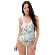Floral Elegance One-Piece Swimsuit - Sleek Women's Swimwear with DelicImmerse yourself in the delicate beauty of our Floral Elegance One-Piece Swimsuit. Designed with a sophisticated palette of blooming florals, this swimsuit brings thDesigns by SAASDesigns by SAAS-Piece Swimsuit - Sleek Women'