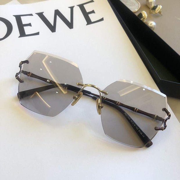 New Rimless Cut Edge Sunglasses For Women
 


 
 
 Product information:
 
 Glasses structure: frame
 
 Polarizing or not: Yes
 
 Lens material: resin
 
 Style: elegant
 
 Frame material: Metal
 
 UV resistaMSAAS Merch DesignDesigns by SAASRimless Cut Edge Sunglasses