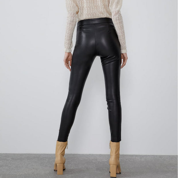 Mid-rise faux leather leggingsDesigns by SAAS