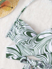 Jungle Rhythm: Swirl-Patterned Twist-Front Bikini Set with Ring AccentDive into the exotic appeal of our "Jungle Rhythm Bikini Set," a swimwear piece that marries the untamed spirit of the wild with the finesse of modern design. This tDesigns by SAASDesigns by SAASJungle Rhythm